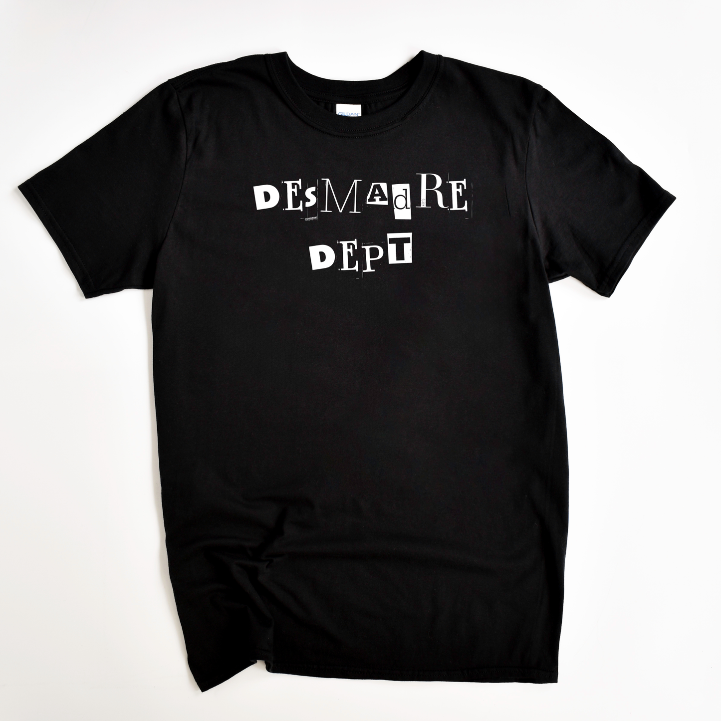 Desmadre Dept. Graphic Tee - Funny Latinx Chaos Shirt | Camiseta para los Reyes del Desmadre
